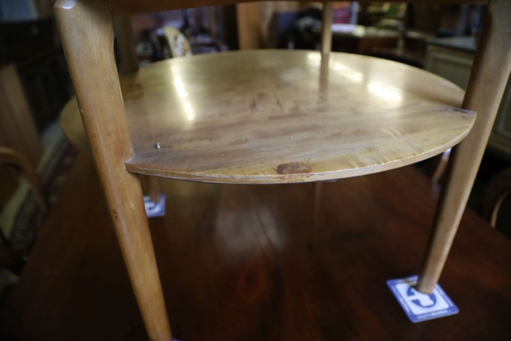 A 1950s satin maple circular occasional table, 64cm diameter, 52cm high